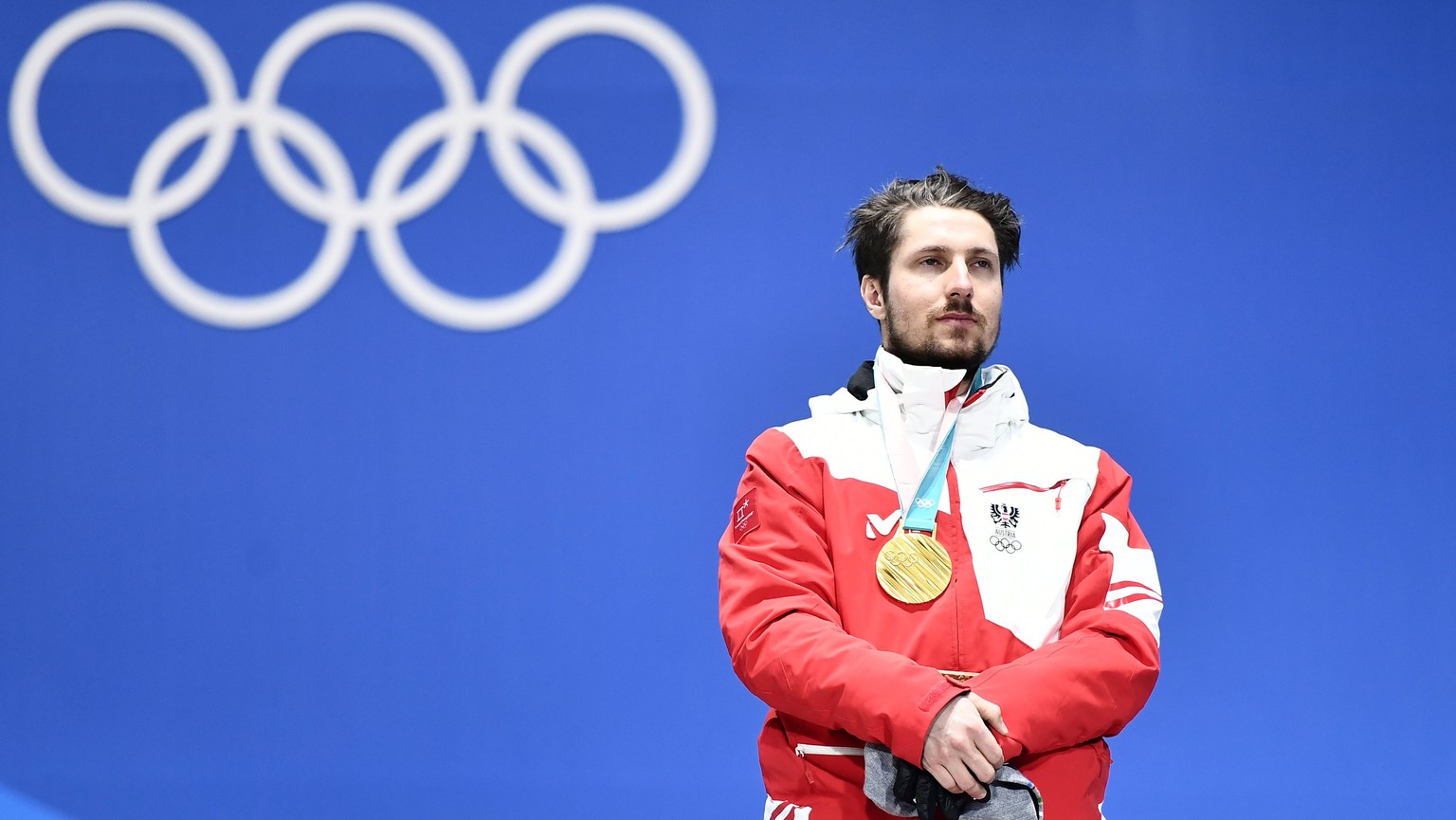 epa06539210 Gold medal winner Marcel Hirscher of Austria during the medal ceremony for the men&#039;s Giant Slalom event during the PyeongChang 2018 Olympic Games, South Korea, 18 February 2018. EPA/C ...
