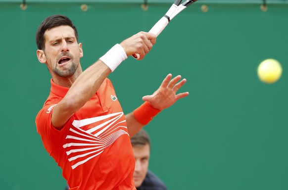 epa07510313 Novak Djokovic of Serbia in action during his second round match against Philipp Kohlschreiber of Germany at the Monte-Carlo Rolex Masters tournament in Roquebrune Cap Martin, France, 16 A ...