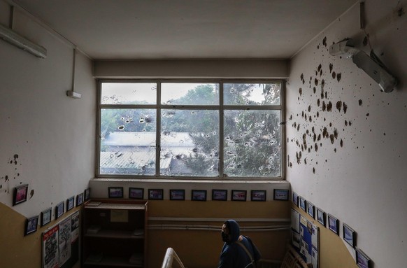 epa08417114 A view of bullet ridden window and walls of MSF (Doctors without Borders) hospital, after an attack in Kabul, Afghanistan, 12 May 2020. According to reports, at least 12 people were killed ...