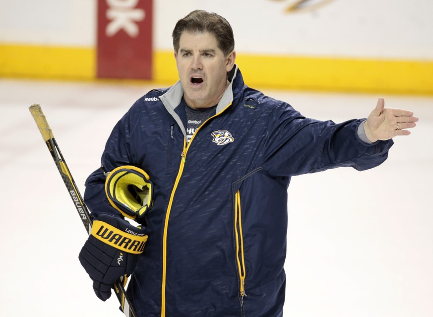 Nashville Predators head coach Peter Laviolette directs a practice Monday, April 13, 2015, in Nashville, Tenn. Laviolette, in his first year as only the second head coach in team history, has the task ...