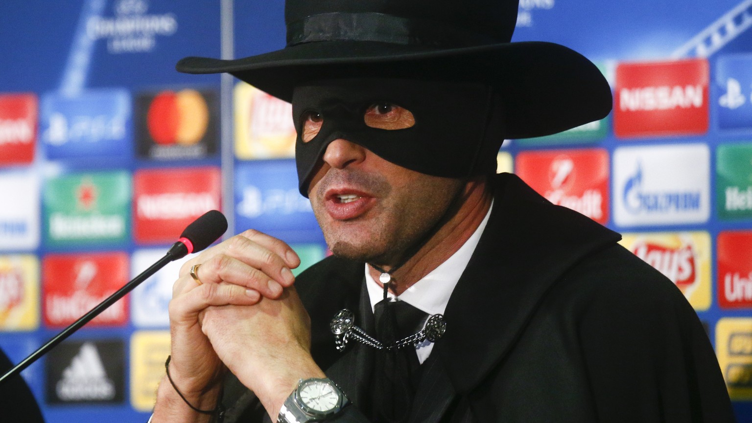 Shakthtar coach Paulo Fonseca, dressed as fictional character Zorro attends a press conference after victory his team in the Champions League group F soccer match between Manchester City and Shakhtar  ...
