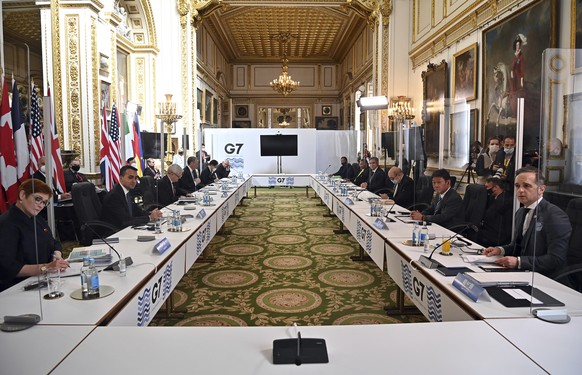 Foreign Ministers are seated prior to a G7 foreign ministers meeting in London, Wednesday, May 5, 2021. Diplomats from the group of wealthy nations are meeting in London for their first face-to-face g ...