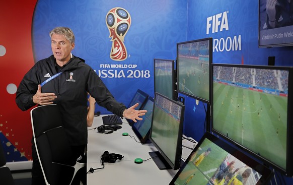 epa06796283 FIFA VAR Refereeing Project Leader Roberto Rosetti presents the video assistant refereeing (VAR) operation room of the 2018 World Cup International Broadcast Centre (IBC) in Moscow, Russia ...