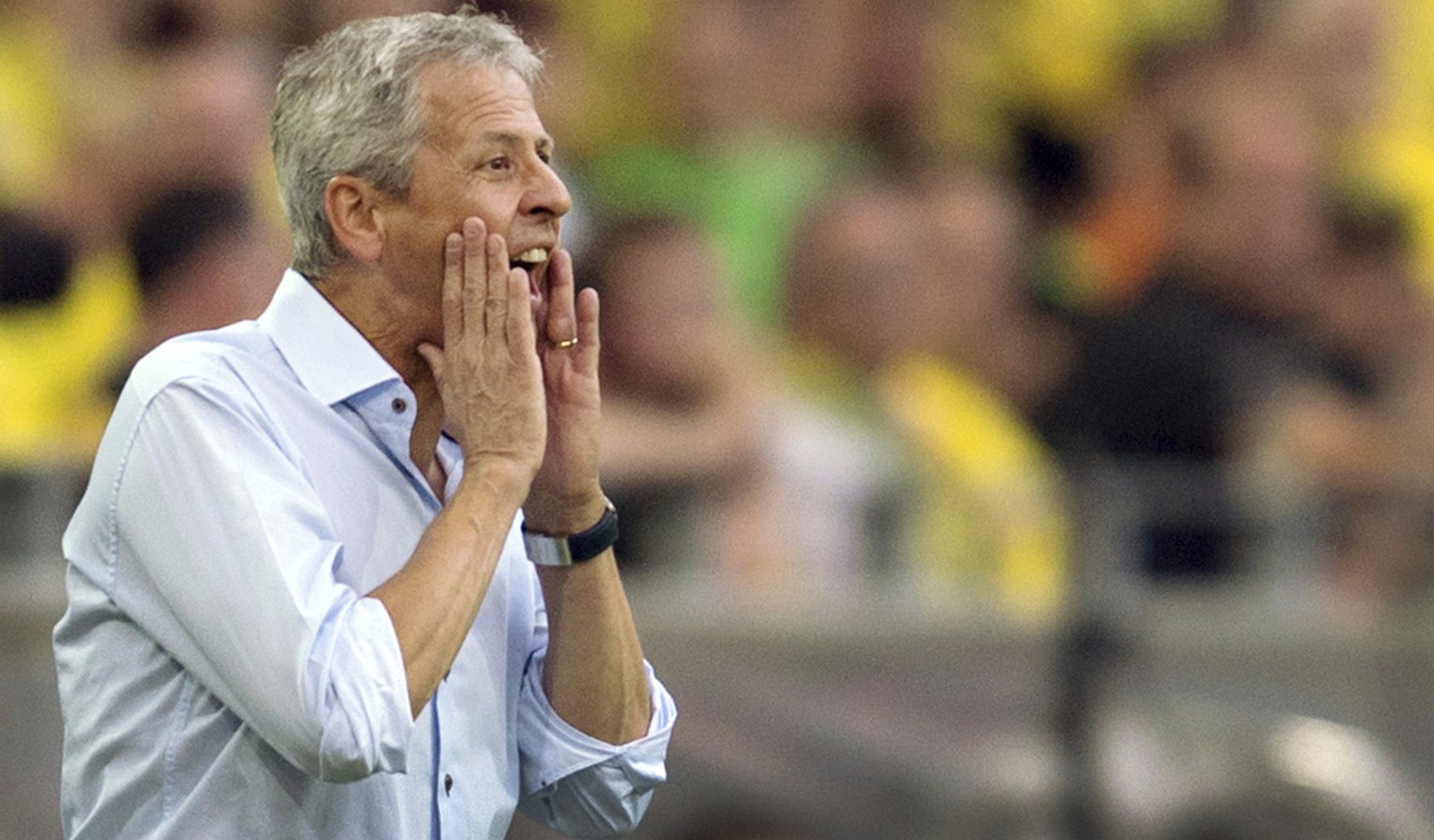 File -- In this August 8, 2015 photo Swiss soccer coach Lucien Favre shouts during a German Bundesliga soccer match between Borussia Dortmund and Borussia Monchengladbach in Dortmund, Germany. (Maja H ...