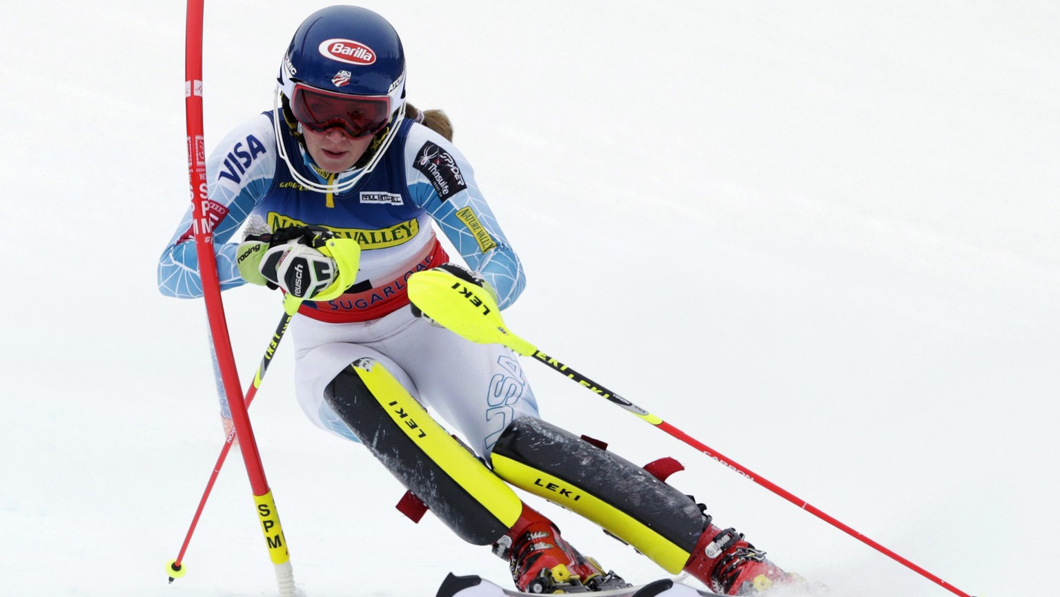 FILE -- In this file photo taken on March 28, 2015, Mikaela Shiffrin, of Vail, Colo., hits a gate during a women&#039;s slalom skiing race at the US Alpine Ski Championship in Carrabassett Valley, Mai ...