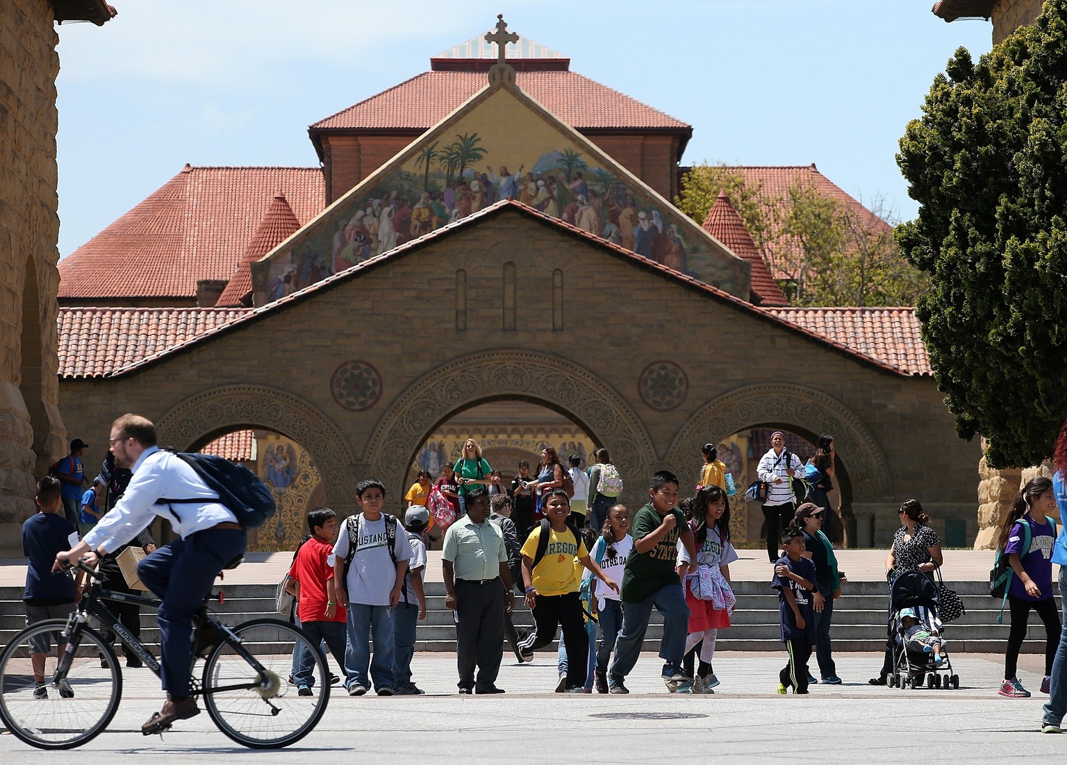 STANFORD, CA - MAY 22: A group of school kids tours the Stanford University campus on May 22, 2014 in Stanford, California. According to the Academic Ranking of World Universities by China&#039;s Shan ...