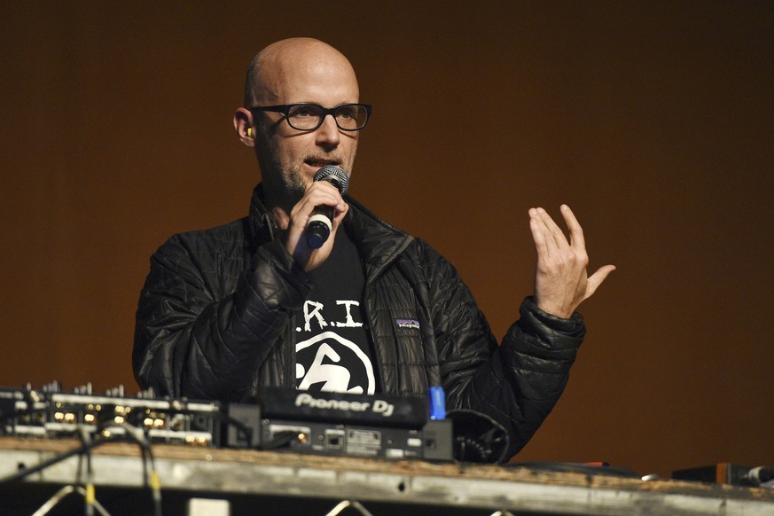 Musical artist Moby addresses the audience at The Last Weekend Rally presented by Swing Left at the Palace Theatre, Thursday, Nov. 1, 2018, in Los Angeles. The event was organized by the progressive S ...