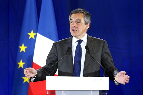 epa05711590 Former French Prime Minister Francois Fillon delivers a speech during a political rally in Nice, France, 11 January 2017. Francois Fillon is a candidate in the upcoming French presidential ...