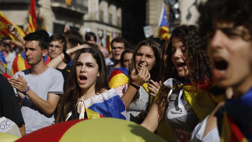 Students take part in a protest against the Spanish government announcement of implementing the article 155 in Catalonia region, in Barcelona, Spain, Thursday, Oct. 26, 2017. Catalonia&#039;s governme ...