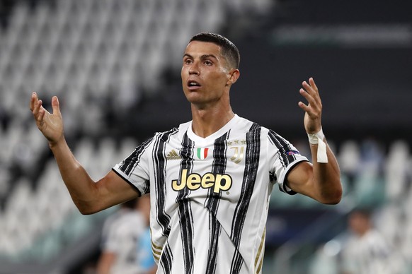 Juventus&#039; Cristiano Ronaldo reacts during the Champions League round of 16 second leg, soccer match between Juventus and Lyon at the Allianz stadium in Turin, Italy, Friday, Aug. 7, 2020. (AP Pho ...