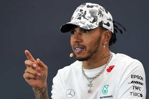 FILE - In this Nov. 3, 2019, file photo, Mercedes driver Lewis Hamilton, of Britain, speaks during a news conference following the Formula One U.S. Grand Prix auto race at the Circuit of the Americas, ...