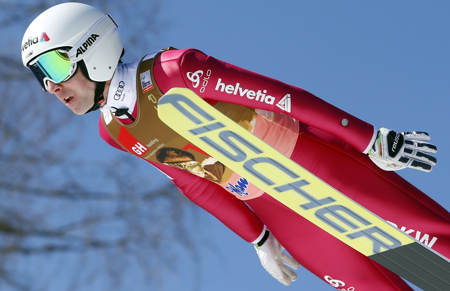 Simon Ammann of Switzerland competes to place eighth at the Ski Jumping World Cup individual event in Planica, Slovenia, Sunday, March 20, 2016. (AP Photo/Darko Bandic)