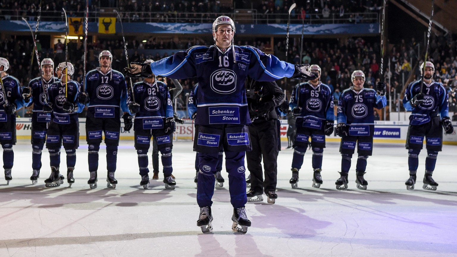 Ambri&#039;s Dominik Zwerger and the team after winning the game between HC Ambri-Piotta and TPS Turku, at the 93th Spengler Cup ice hockey tournament in Davos, Switzerland, Saturday, December 28, 201 ...