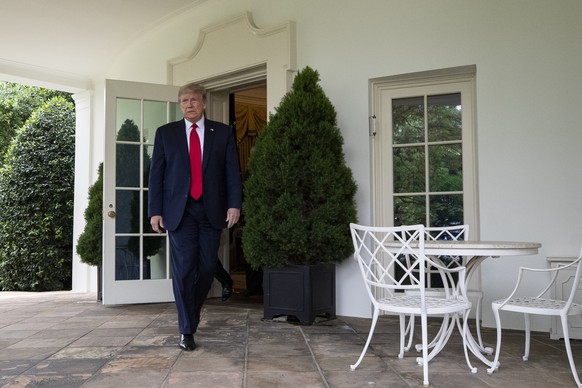 President Donald Trump walks out of the Oval Office to speak in the Rose Garden of the White House, Friday, May 29, 2020, in Washington. (AP Photo/Alex Brandon)
Donald Trump