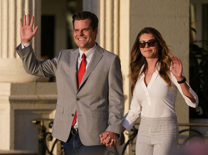 Congressman Matt Gaetz, R-Fla., and his girlfriend Ginger Luckey enter &quot;Women for American First&quot; event, Friday, April 9, 2021, in Doral, Fla. The House Ethics Committee has opened an invest ...