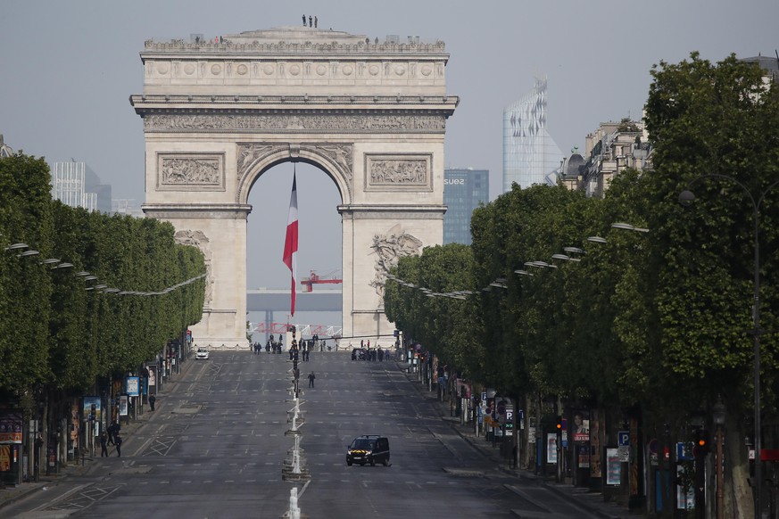 epa08409144 The empty Champs Elysee avenue and the Arc de Triomphe are pictured before VE Day ceremonies in Paris, France, 08 May 2020. Victory in Europe Day, known as VE Day, celebrates Nazi Germany& ...