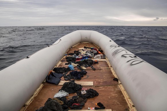 In this photo taken on Sunday Feb. 18, 2018 photo, migrants and refugees&#039; personal belongings lie on a rubber boat after being rescued by aid workers of the Spanish NGO Proactiva Open Arms, after ...