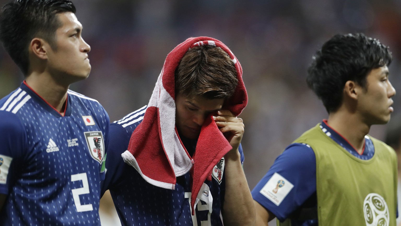 Japan&#039;s disappointed Hiroki Sakai drys a tear with a shirt after losing the round of 16 match between Belgium and Japan at the 2018 soccer World Cup in the Rostov Arena, in Rostov-on-Don, Russia, ...