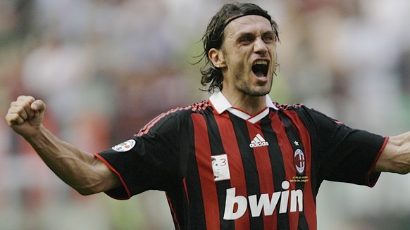 FILE - In this May 24, 2009 file photo AC Milan defender Paolo Maldini salutes his fans at the end of his last match at the San Siro stadium, after 24 years and 901 games for the club. Maldini has bee ...