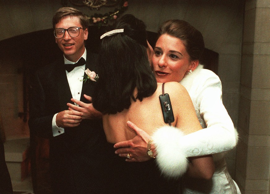 FILE - In this Jan. 9, 1994, file photo, computer mogul Bill Gates III and bride Melinda French greet guests in a reception line at a private estate in Seattle. The couple was married in Hawaii the we ...