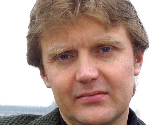 Alexander Litvinenko, former KGB spy and author of the book &quot;Blowing Up Russia: Terror From Within&quot;, photographed at his home in London in this Friday, May 10, 2002 photo. Police said Sunday ...