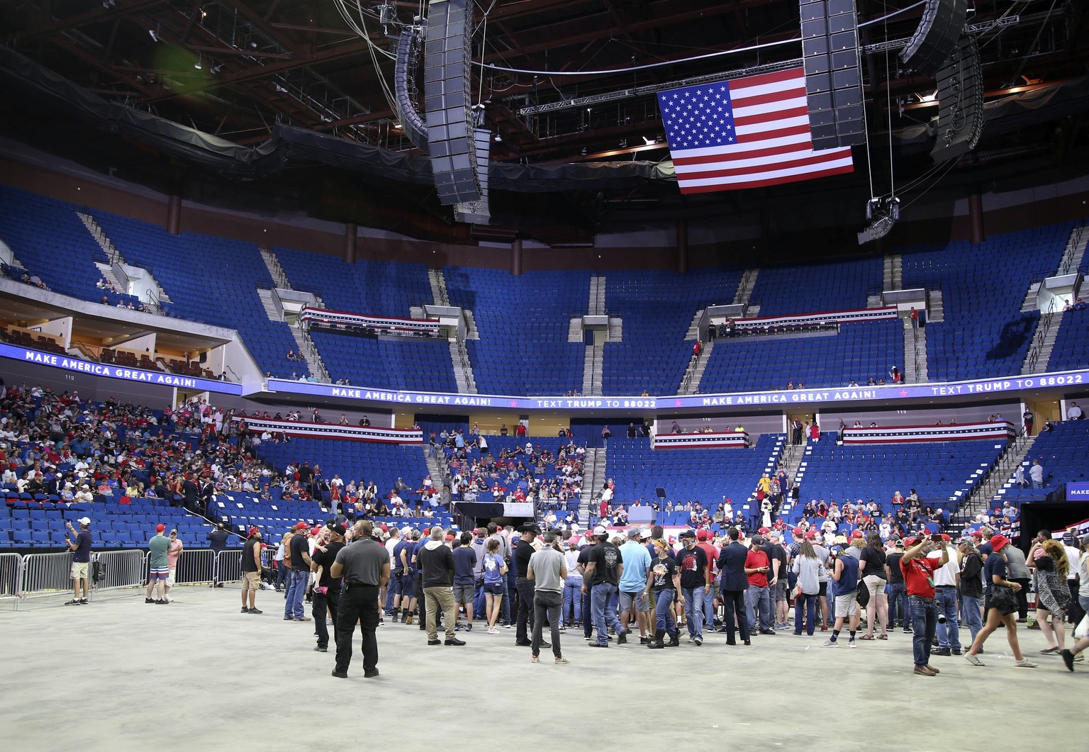 People begin to fill the arena floor before a campaign rally for President Donald Trump at BOK Center in downtown Tulsa, Okla., Saturday, June 20, 2020. (Matt Barnard/Tulsa World via AP)