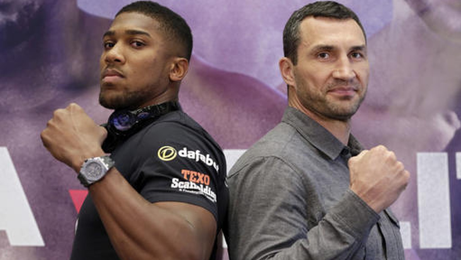 FILE - In this Jan. 31, 2017, file photo, IBF heavyweight champion Anthony Joshua, left, and former heavyweight champion Wladimir Klitschko pose for photos during a news conference at New York&#039;s  ...