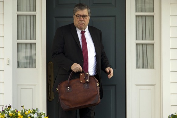 FILE - In this March 22, 2019, file photo, Attorney General William Barr leaves his home in McLean, Va. Barr told Congress on March 29, to expect version of special counsel&#039;s Russia report by mid ...