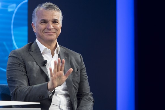 epa07315127 Swiss bank UBS CEO Sergio P. Ermotti reacts during a panel session at the 49th annual meeting of the World Economic Forum, WEF, in Davos, Switzerland, 24 January 2019. The meeting brings t ...