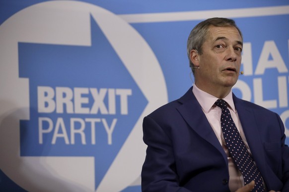 Nigel Farage the leader of the Brexit Party takes questions from journalists during an election press conference in London, Tuesday, Dec. 10, 2019. Britain goes to the polls on Dec. 12. (AP Photo/Matt ...
