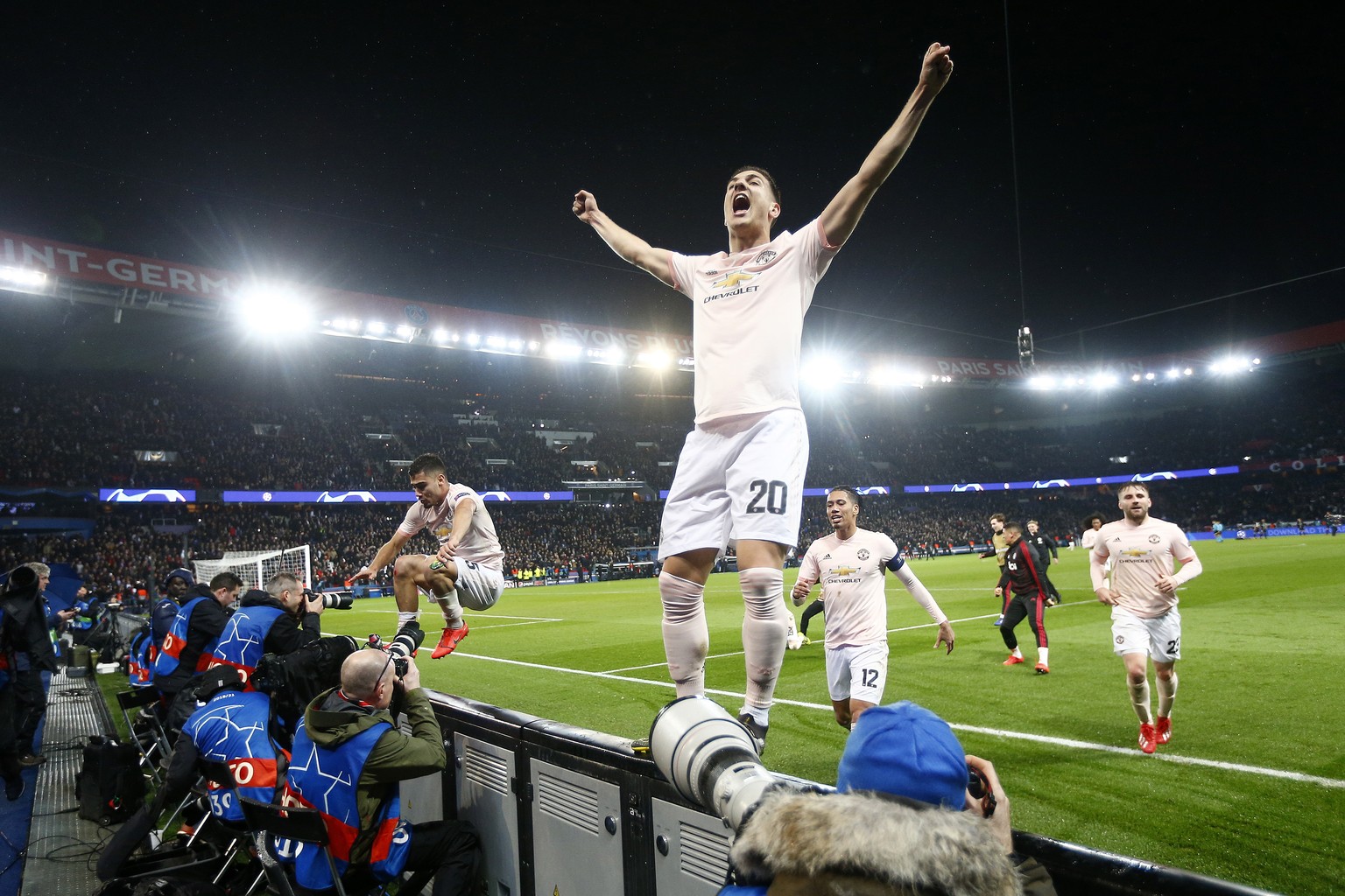 epa07418331 Manchester&#039;s Diogo Dalot celebrates after the UEFA Champions League round of 16 second leg soccer match between PSG and Manchester United at the Parc des Princes Stadium in Paris, Fra ...