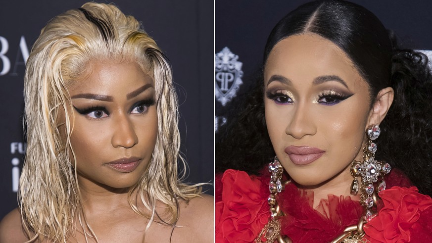 This combination photo shows Nicki Minaj, left, and Cardi B at the Harper&#039;s BAZAAR &quot;ICONS by Carine Roitfeld&quot; party at The Plaza in New York on Sept. 7, 2018. Minaj says being involved  ...