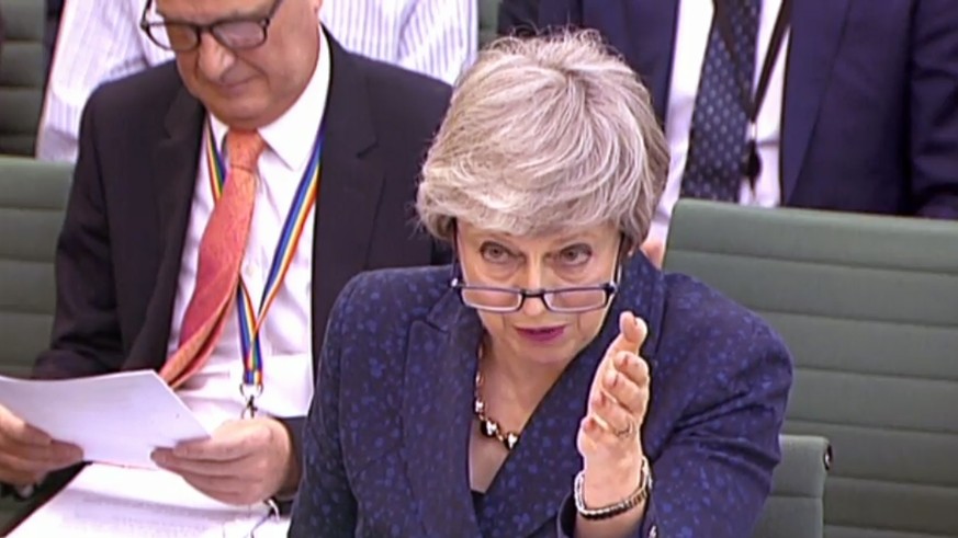 epa07540406 A grab from a handout video made available by the UK Parliamentary Recording Unit shows British Prime Minister, Theresa May
answering questions over Brexit as she appears before the Britis ...