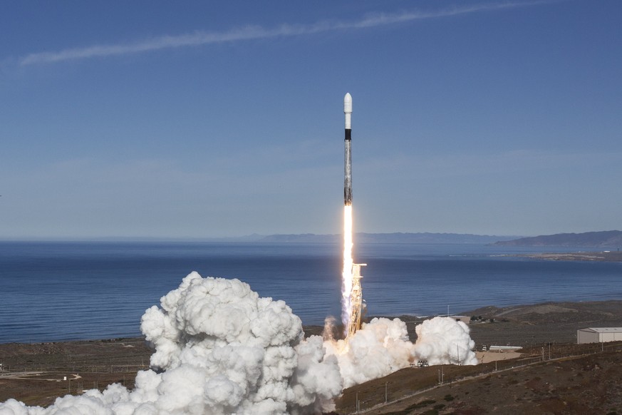 epa07207420 A handout photo made available by SpaceX shows the Falcon 9 rocket lifting off while carrying a payload of 64 spacecraft during the Spaceflight SSO-A: SmallSat Express mission
launch at Va ...