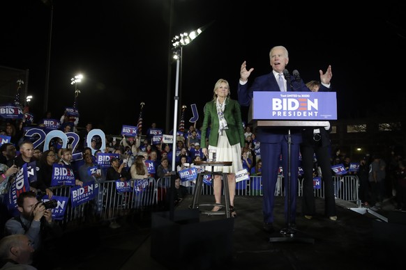 Democratic presidential candidate former Vice President Joe Biden, right, speaks next to his wife Jill during a primary election night rally Tuesday, March 3, 2020, in Los Angeles. (AP Photo/Marcio Jo ...