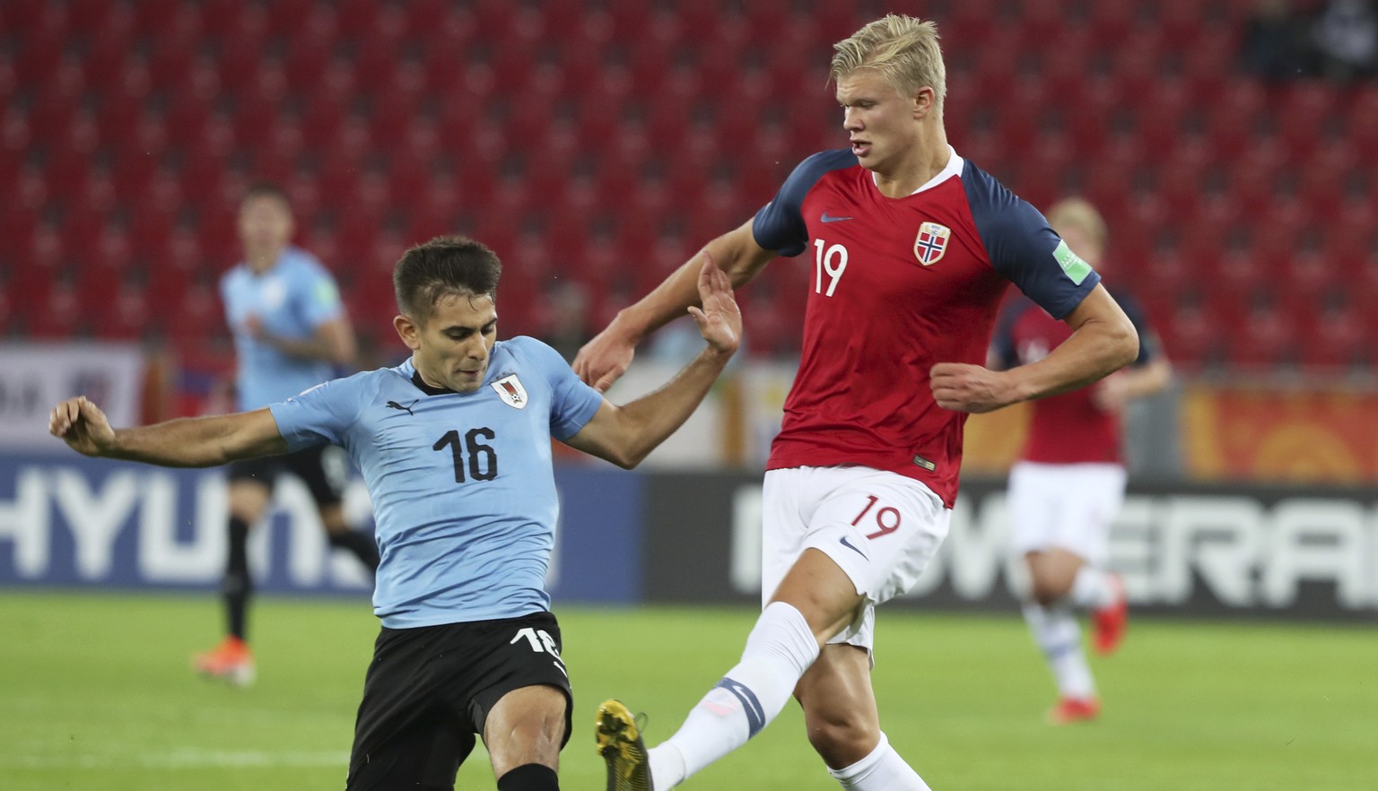 Uruguay&#039;s Nicolas Acevedo, left, and Norway&#039;s Erling Haland vie for the ball during the Group C U20 World Cup soccer match between Uruguay and Norway in Lodz, Poland, Friday, May 24, 2019. ( ...