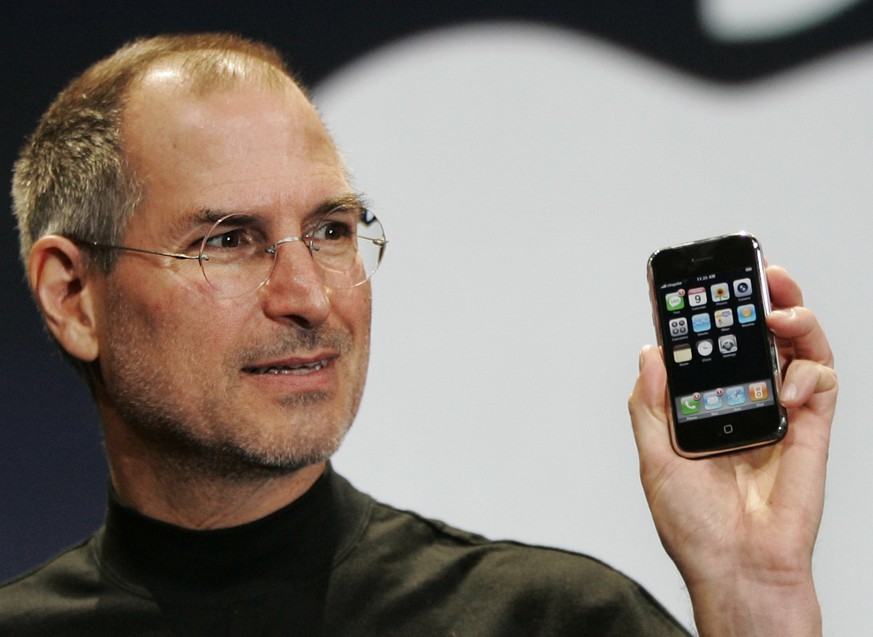 Apple CEO Steve Jobs demonstrates the new iPhone during his keynote address at MacWorld Conference &amp; Expo in San Francisco, Tuesday, Jan. 9, 2007. (AP Photo/Paul Sakuma)
