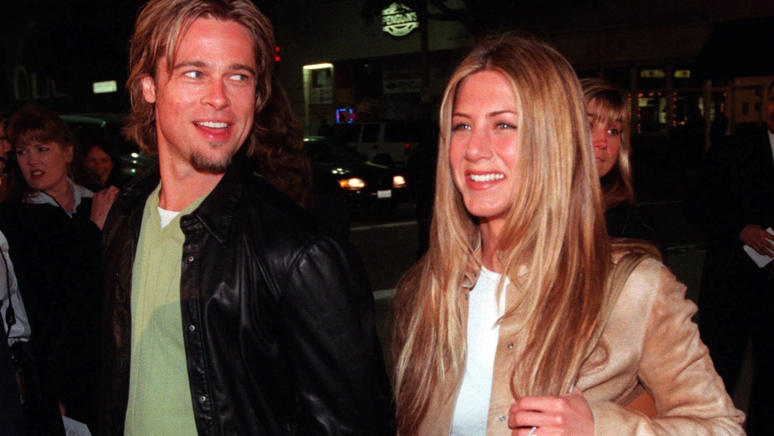 FILE - In this March 14, 2000 file photo, actor Brad Pitt, left, and actress Jennifer Aniston, arrive at the premiere of the new film &quot;Erin Brockovich,&quot; in the Westwood section of Los Angele ...