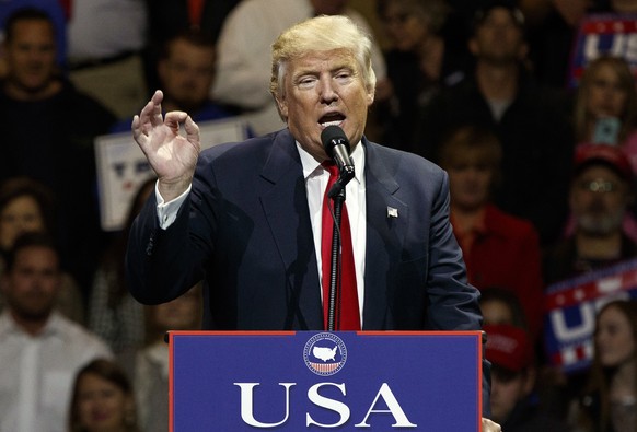 FILE - In this Dec. 1, 2016, photo, President-elect Donald Trump gestures as he speaks during a &quot;USA Thank You&quot; tour event in Cincinnati. Russia’s government staunchly denies reports that it ...