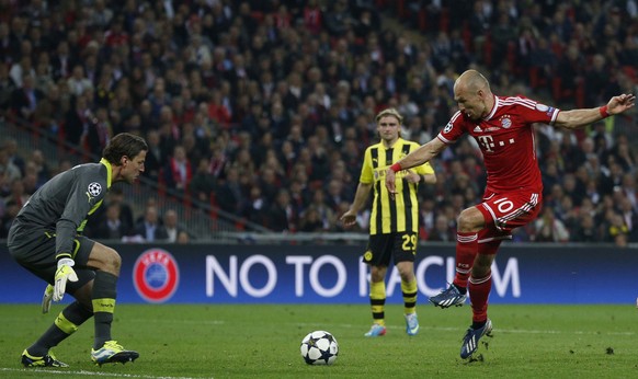 Bayern&#039;s Arjen Robben of the Netherlands scores during the Champions League Final soccer match between Borussia Dortmund and Bayern Munich at Wembley Stadium in London, Saturday May 25, 2013. (AP ...