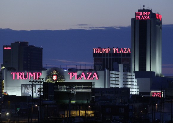FILE - This Feb. 29, 2012 file photograph shows the Trump Plaza Hotel and Casino and Caesars Atlantic City Hotel and Casino, left back, in Atlantic City, N.J. Republican presidential candidate Donald  ...