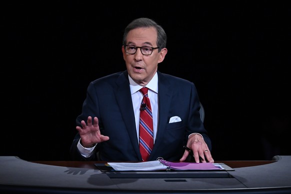 FILE - Moderator Chris Wallace of Fox News speaks as President Donald Trump and Democratic presidential candidate former Vice President Joe Biden participate in the first presidential debate in Clevel ...