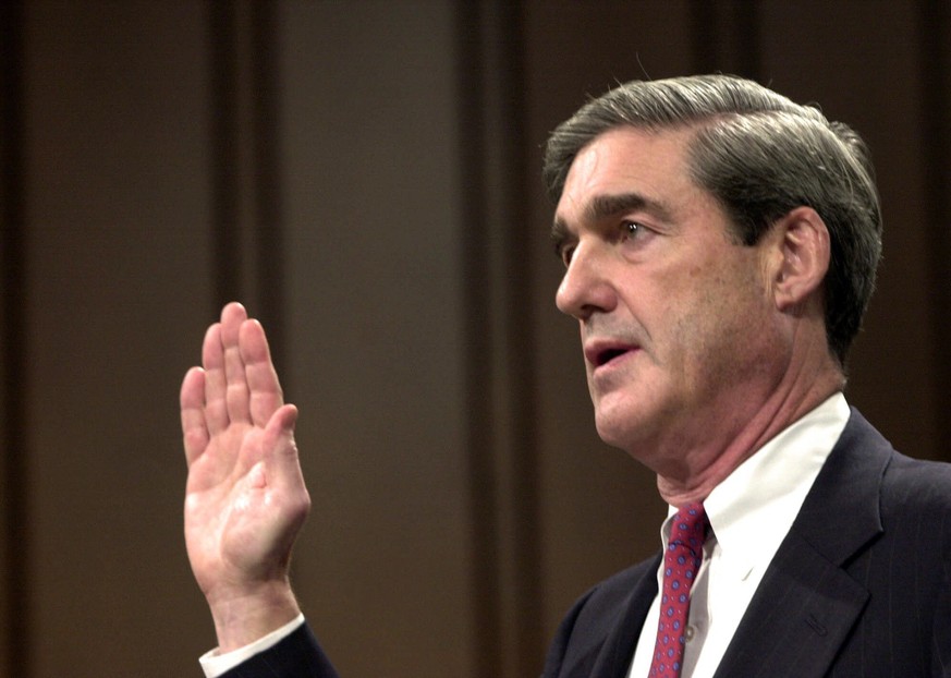 FILE - In this July 30, 2001, file photo, Robert Mueller is sworn in at the start of his testimony during his confirmation hearing before the Senate Judiciary Committee on Capitol Hill in Washington,  ...