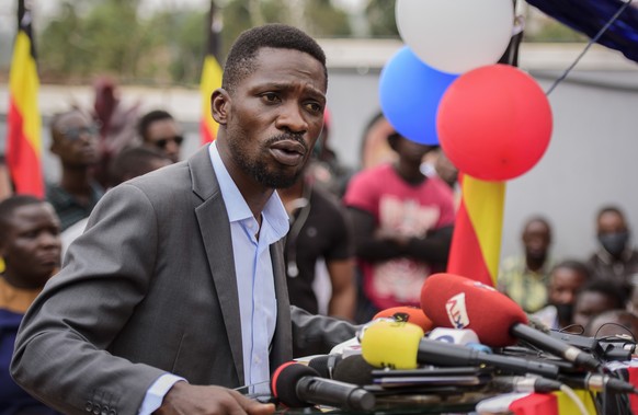 Ugandan opposition figure Bobi Wine, whose real name is Kyagulanyi Ssentamu, speaks at a press conference in Kampala, Uganda Monday, Feb. 22, 2021. Wine says he will withdraw a legal petition that sou ...