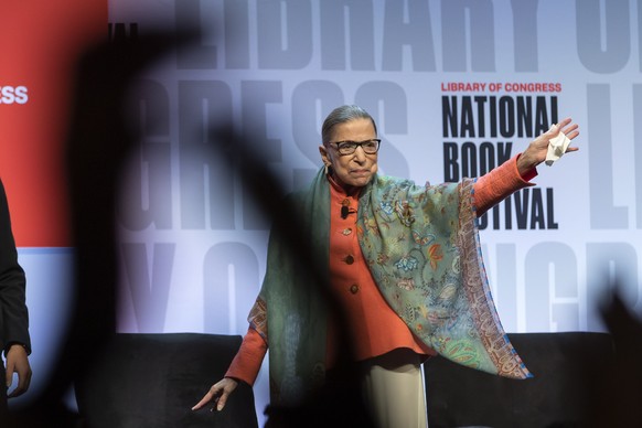 epa08679871 (FILE) - US Supreme Court Justice Ruth Bader Ginsburg gestures to the attendees of her presentation at the National Book Festival presented by the Library of Congress at the Walter E. Wash ...