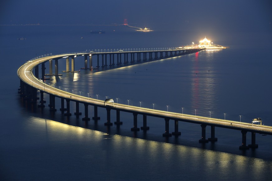 The Hong Kong-Zhuhai-Macau Bridge is lit up in Hong Kong, Monday, Oct. 22, 2018. The bridge, the world&#039;s longest cross-sea project, which has a total length of 55 kilometers (34 miles), will have ...