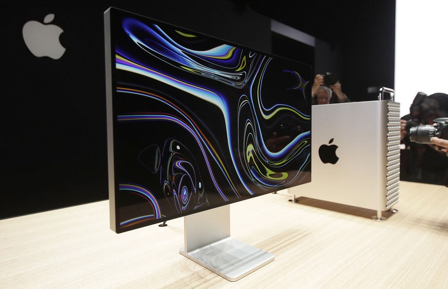 FILE - In this June 3, 2019, file photo a monitor of the Mac Pro is shown in the display room at the Apple Worldwide Developers Conference in San Jose, Calif. President Donald Trump is vowing to slap  ...
