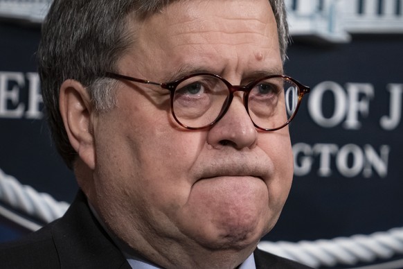 FILE - In this Jan. 13, 2020, file photo Attorney General William Barr speaks to reporters at the Justice Department in Washington to announce results of an investigation of the shootings at the Pensa ...