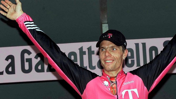 epa07564976 (FILE) German Danilo Hondo of Telekom team jubilates on winner&#039; s podium after winning the 149 km third stage of the 84th Giro d&#039; Italia cycling tour from Lucera to Potenza on Tu ...