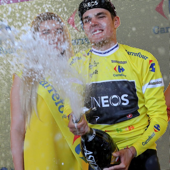 epa07764327 Russian cyclist Pavel Sivakov of the Ineos team celebrates on the podium after winning the 76th Tour de Pologne 2019 cycling race, in Bukowina Tatrzanska, southern Poland, 09 August 2019.  ...